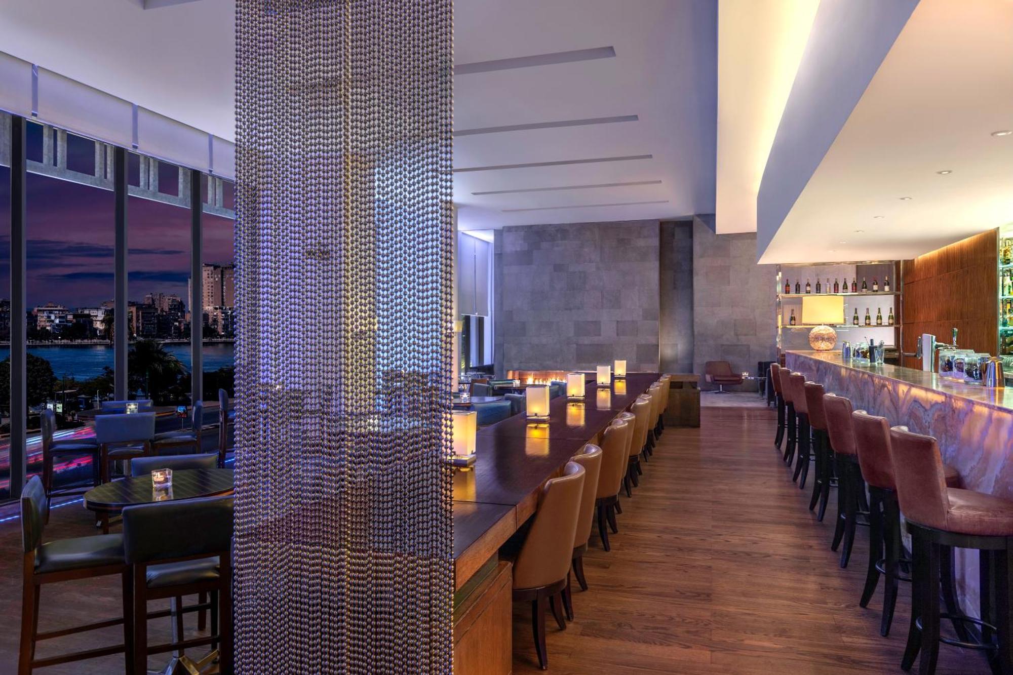Sofitel Cairo Downtown Nile Hotel Ngoại thất bức ảnh The bar at the 101 bar